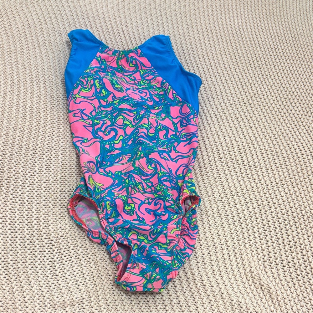 Child large blue pink and green pattern leotard for gymnastics
